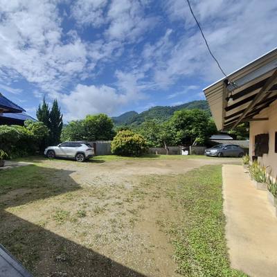 The courtyard between the workshop buildings, looking out to the mountains