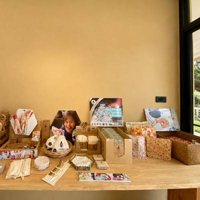SuperBee wraps, bags and tabs laid out on the showroom table