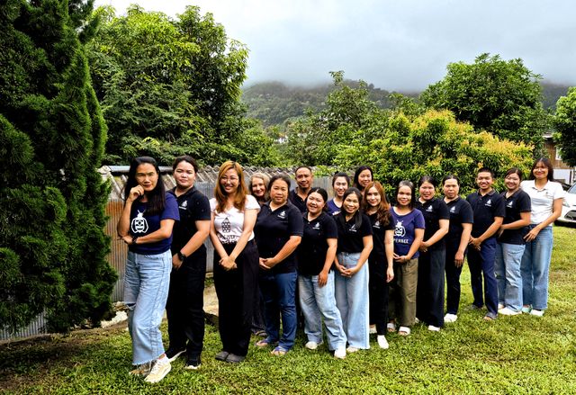 The SuperBee artisan team standing together outside the workshop in Hang Dong, Chiang Mai