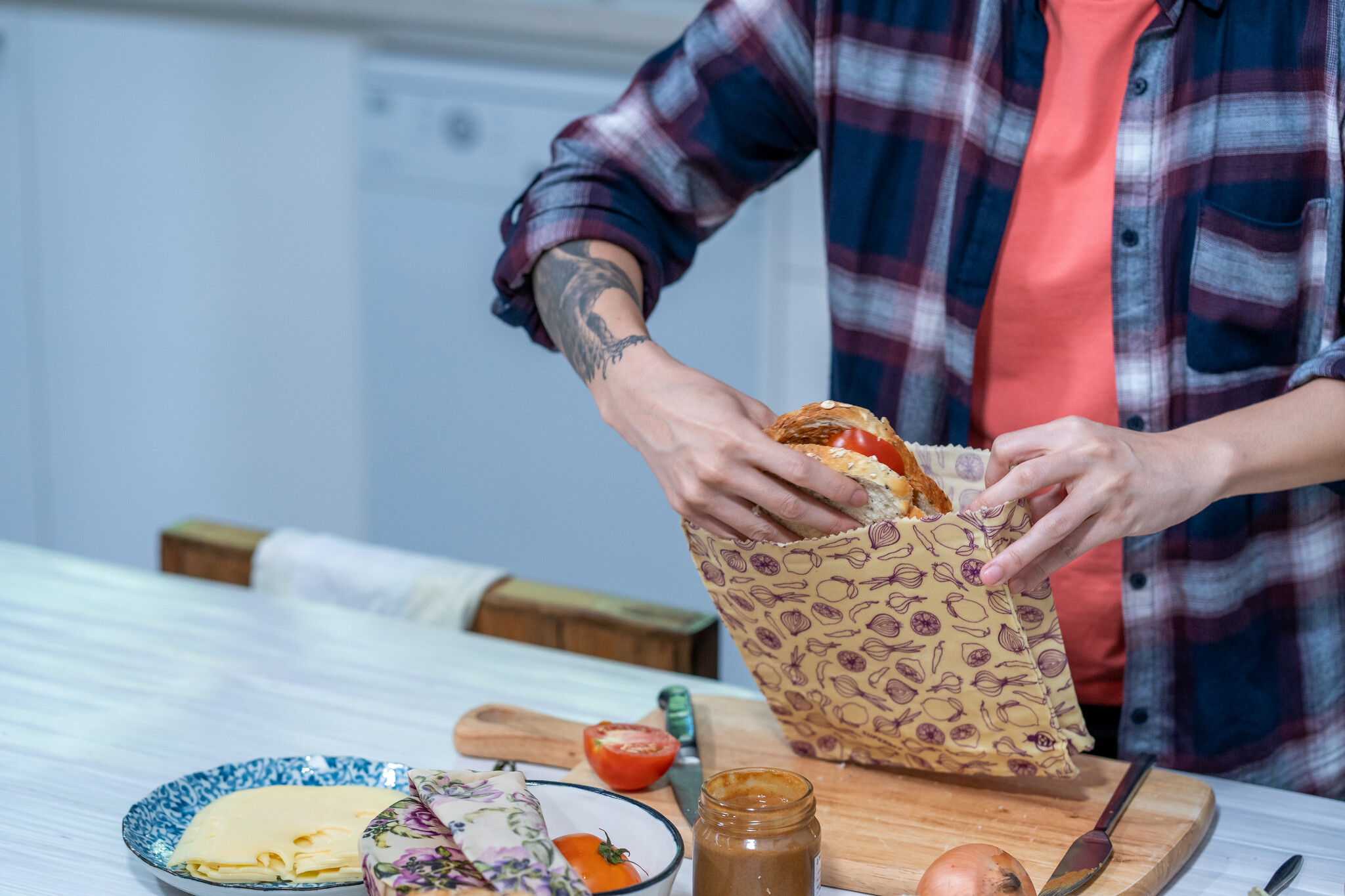 Packing a sandwich in wax bag for school lunch
